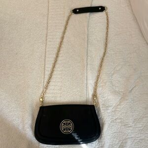Tory Burch - black clutch with strap